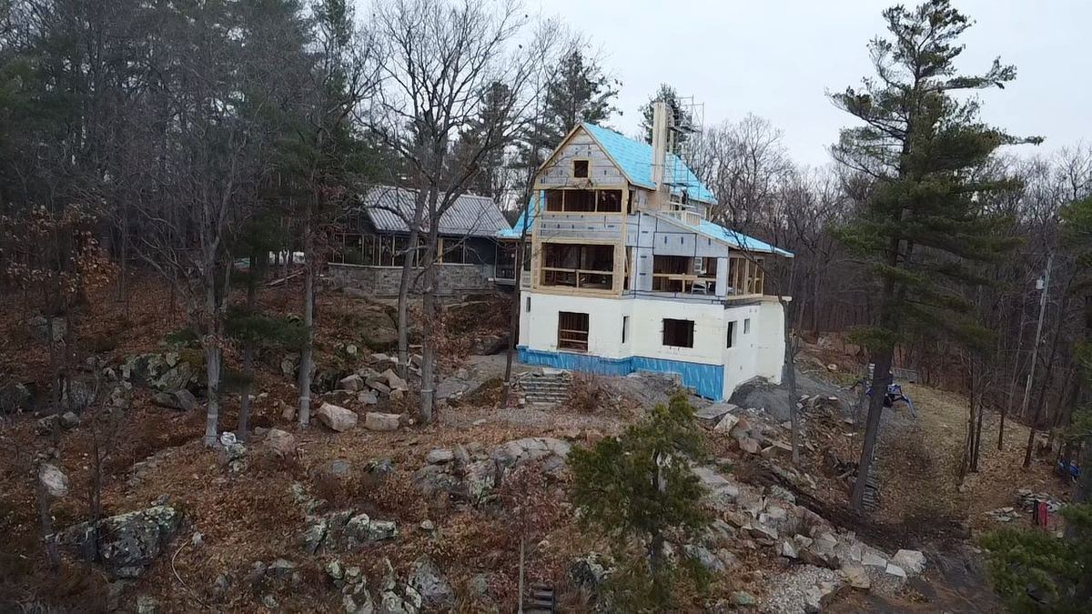 House on a rocky, wooded lot in the Ottawa Valley